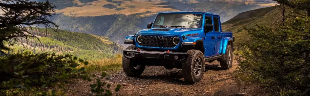 All-new blue Jeep Gladiator in mountains